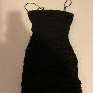 HOUSE OF CB little black ruched dress.